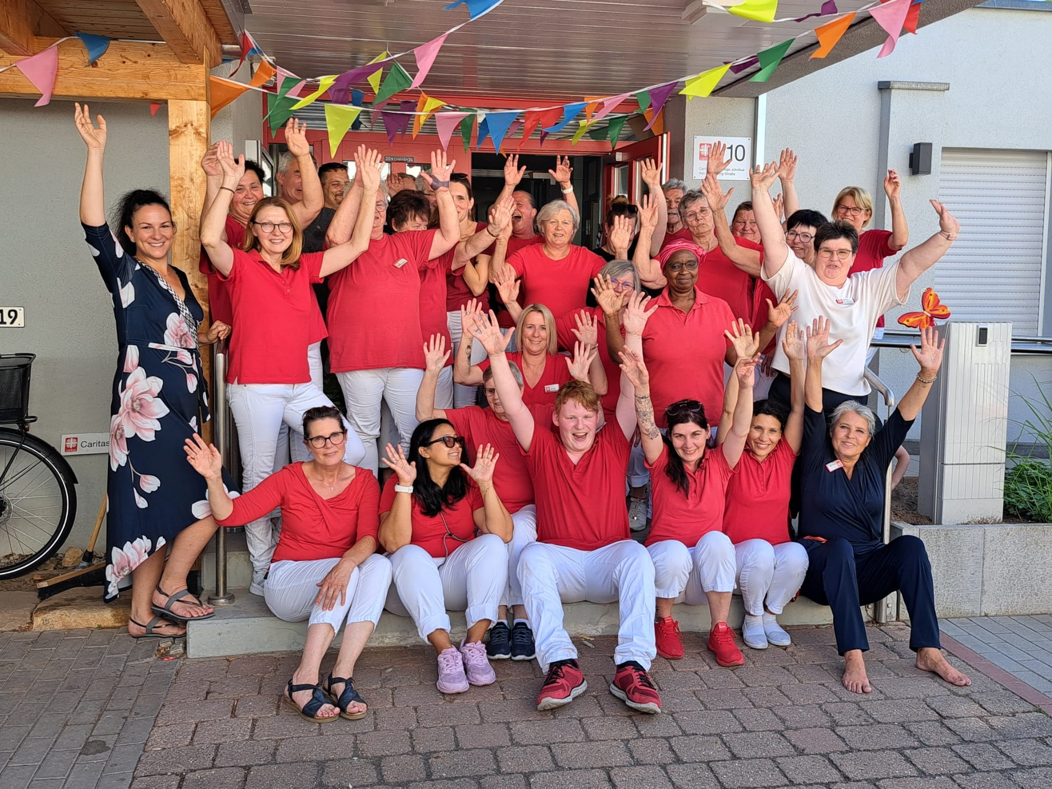 Fröhliches Pflegeteam der Caritas Neunkirchen am Brand